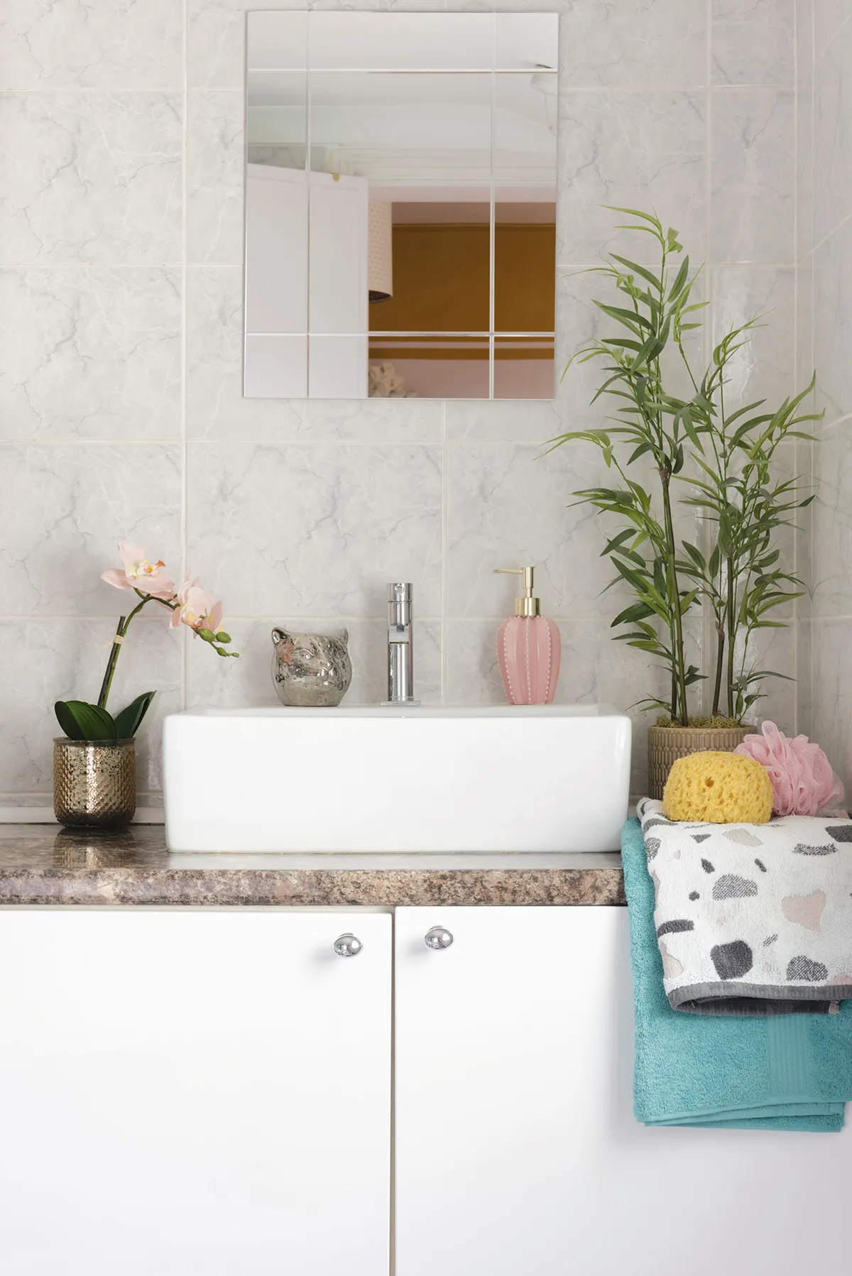 ‘I’ve added a few accessories and faux plants in the bathroom, plus a couple of pictures, to try and add character, but really it needs a complete overhaul, so we need to save up a bit first’