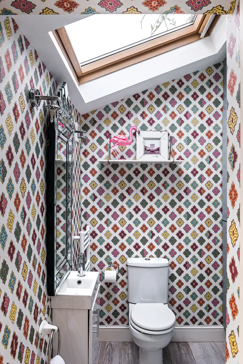 Christian Lacroix Alcazar Milticolore wallpaper sourced from the designers Guilding in small cloakroom with wasbasin