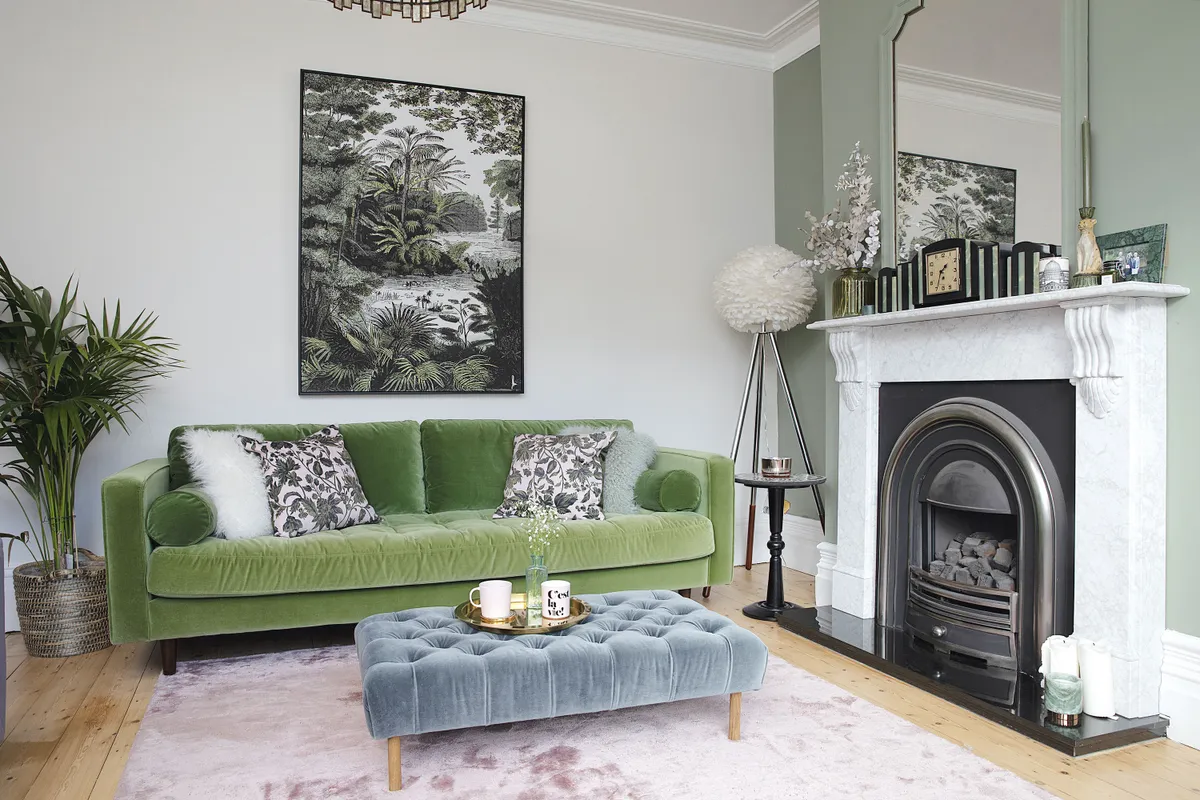‘It took me ages to find the right art for this wall. I finally found this jungle print in HomeSense, which I love. It works really well with the green sofa from MADE.com’