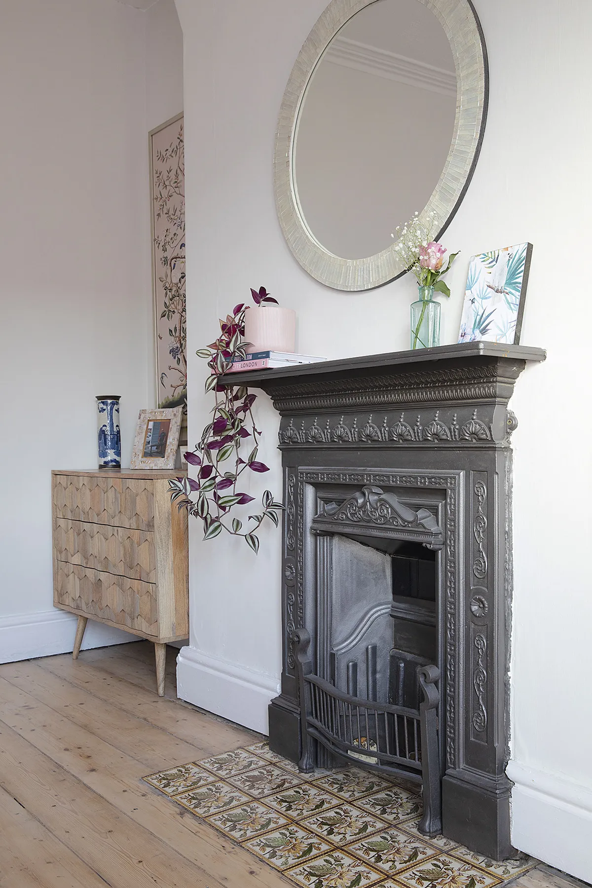 ‘The reclaimed fireplace is definitely my favourite feature in the room. It has beautiful details and took lots of hard work and time to restore it. The chest of drawers is from Swoon’