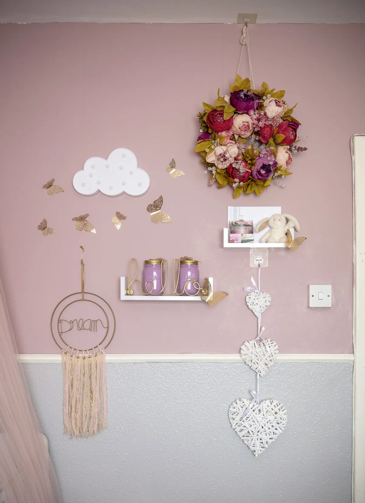 Alimah loves crafting, especially for her children’s rooms. She made the faux floral wreath for a whimsical touch. ‘I customised the jars with pink and gold paint to house cotton buds and hair bands, too,’ she says