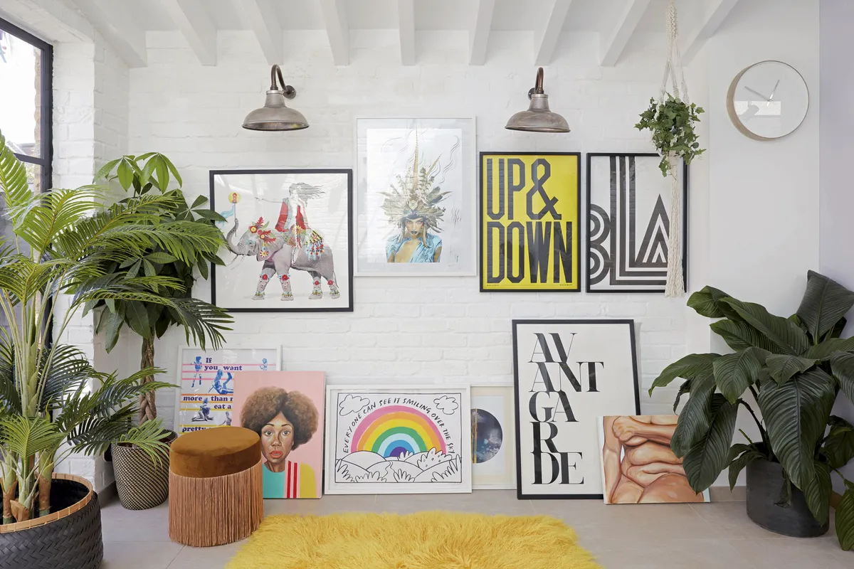 ‘Strong colours and pieces with a big presence can look hectic,’ says Natalie, ‘so a neutral base was called for’. Natalie has painted the exposed beams to match the white walls and the industrial-style lights are salvaged pieces