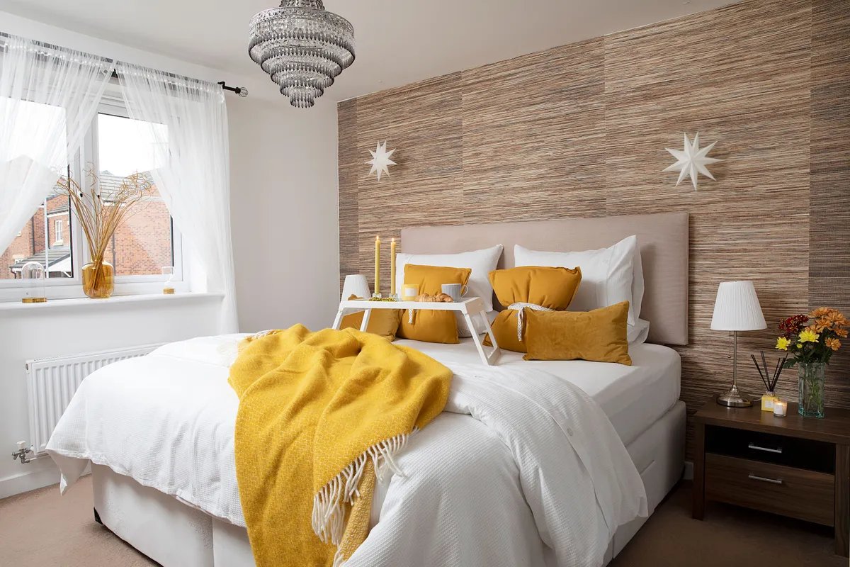 Neutral décor means Zillah can transform her bedroom’s look by adding accessories in accent hues. With a keen eye for a high street bargain, her collection means she can easily switch up the colour scheme
