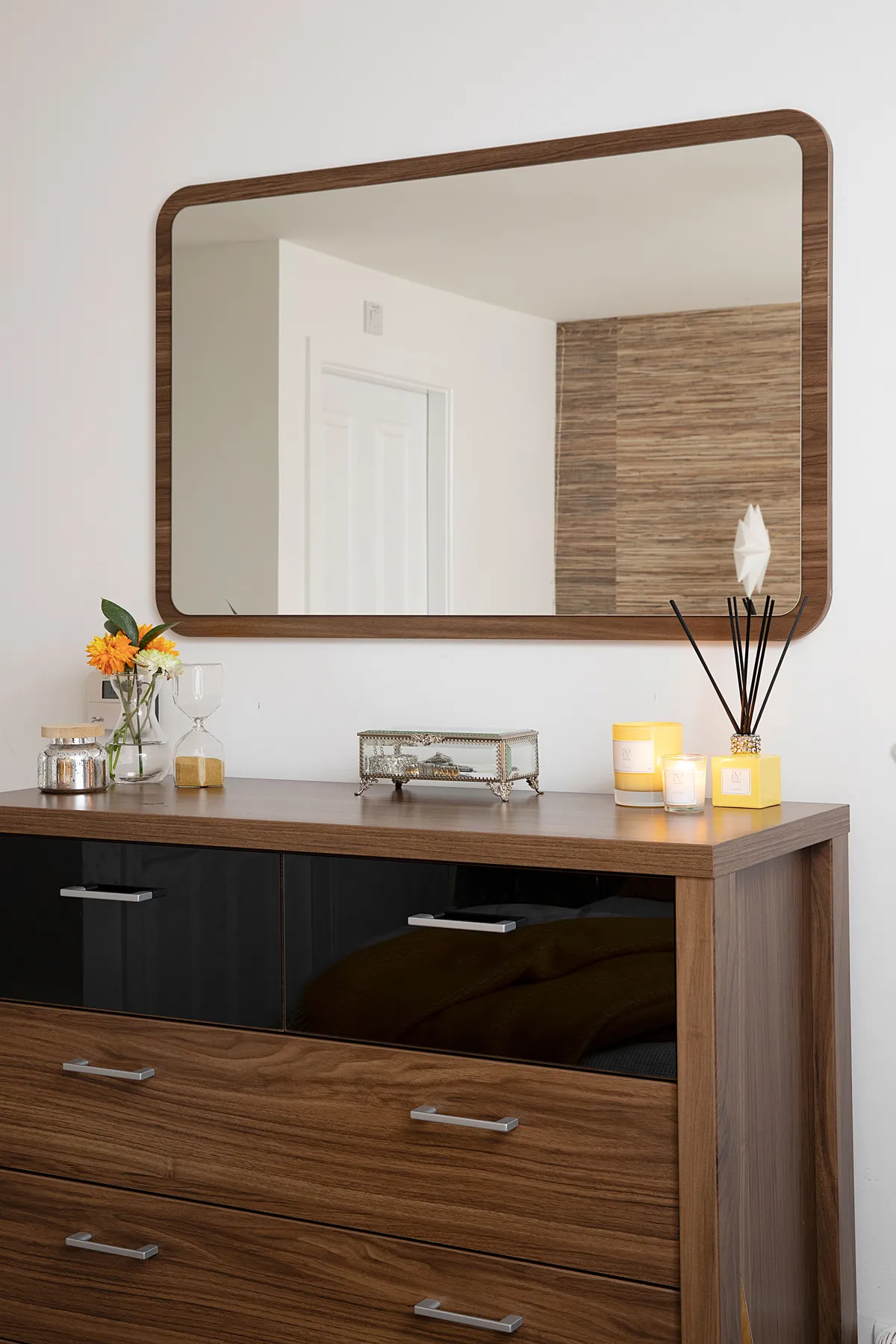 To be savvy with the space, Zillah has doubled up her chest of drawers as both essential storage and a dressing table