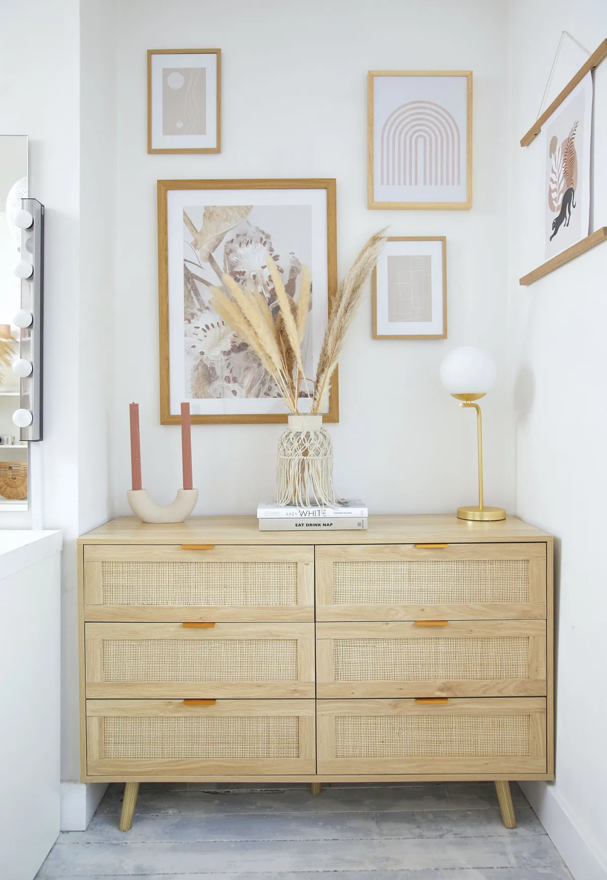 ‘I love a gallery wall and choose prints with colours that suit each room. I wanted light pink and neutral tones in here, and played around with scale for a less structured feel’