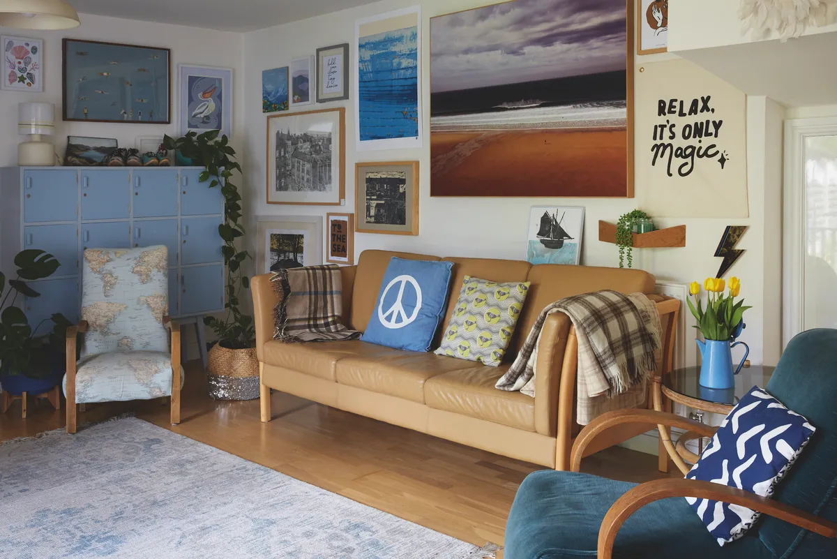 The open-plan lounge features coastal-inspired artwork and Danish and mid-century furniture. ‘We source it from vintage and antique dealers and online,’ Jess says