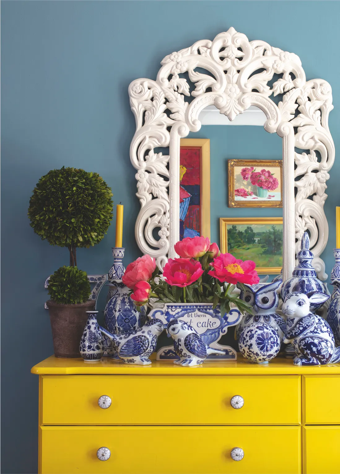 Although her chest of drawers is practical storage for Anna’s paperwork and office bits and bobs, it’s anything but boring thanks to a lick of yellow paint and ceramic clock handles