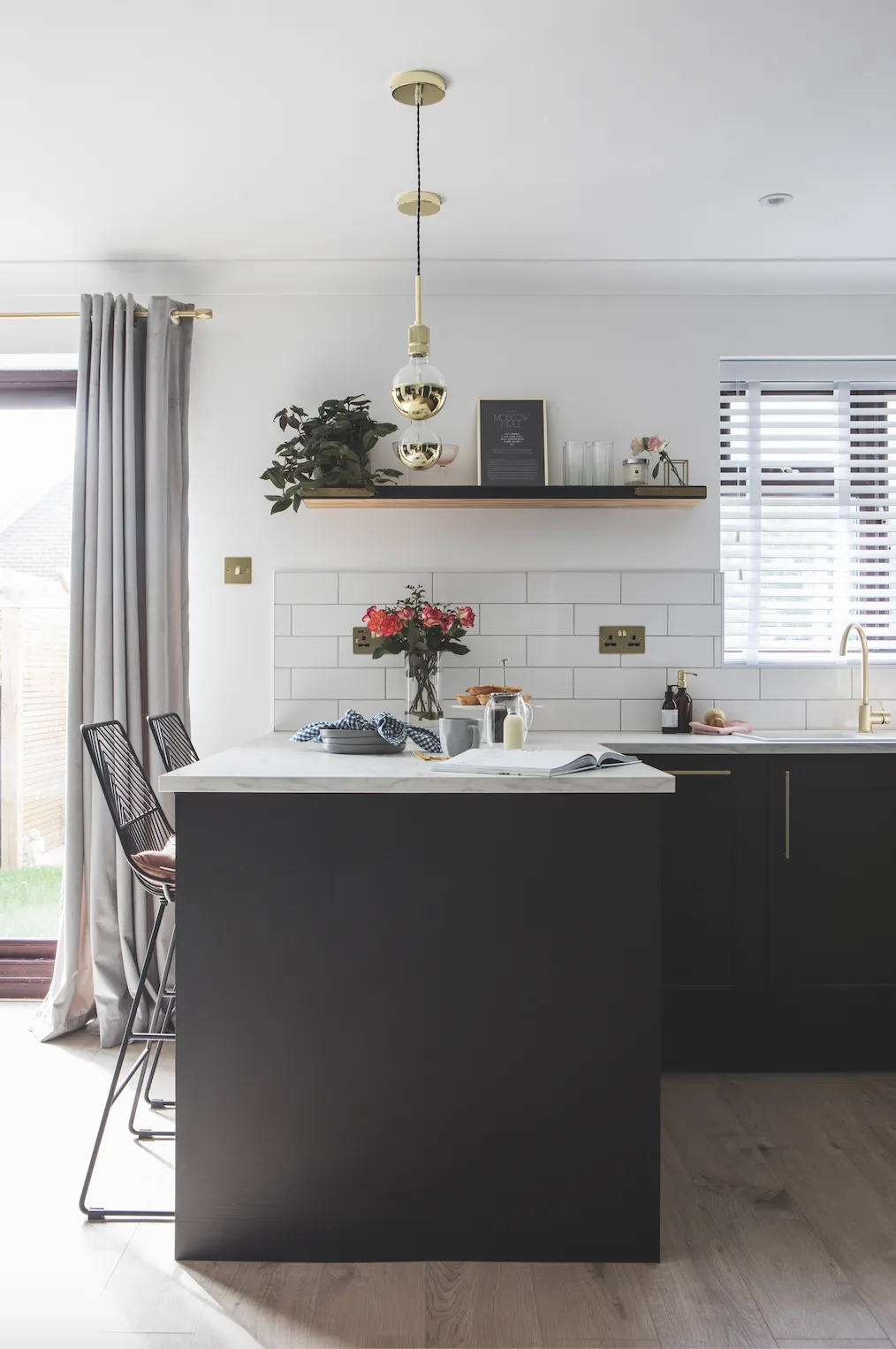 The breakfast bar is a focal point thanks to custom pendants from Creative Cables. ‘I put together my own look choosing the ceiling rose, cable, lamp holder and half-brass bulbs, which look lovely without lampshades,’ says Becca