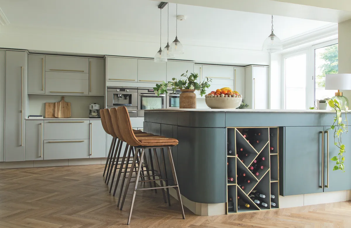 Despite being the same units, the kitchen is unrecognisable from its previous incarnation of black, gloss cabinets and white, glitter- effect floor tiles. Jade and Andrew painstakingly peeled back the gloss from the cabinets before painting them