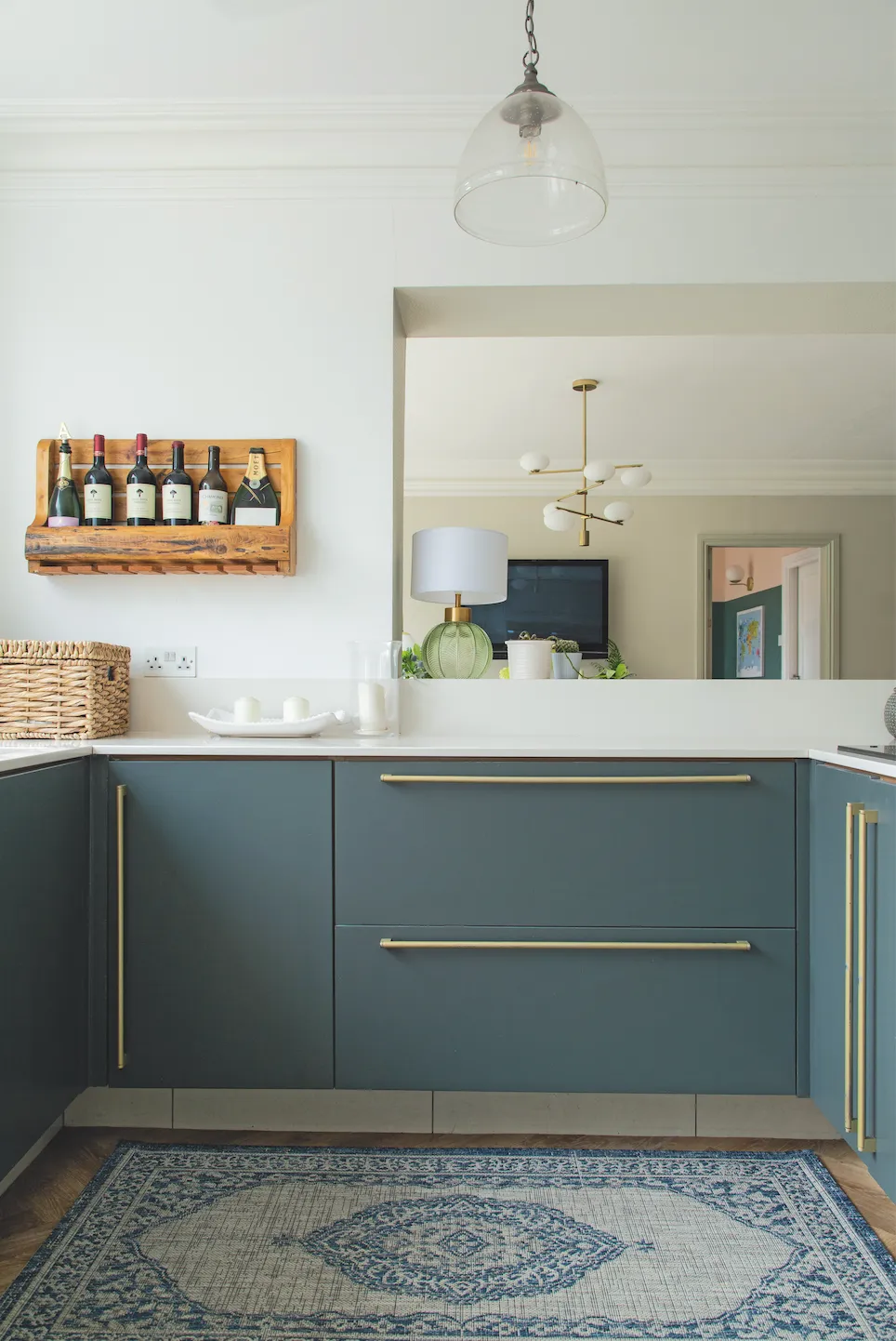 Spray paint kitchen handles in gold, like Jade, for a sleek new look on a budget