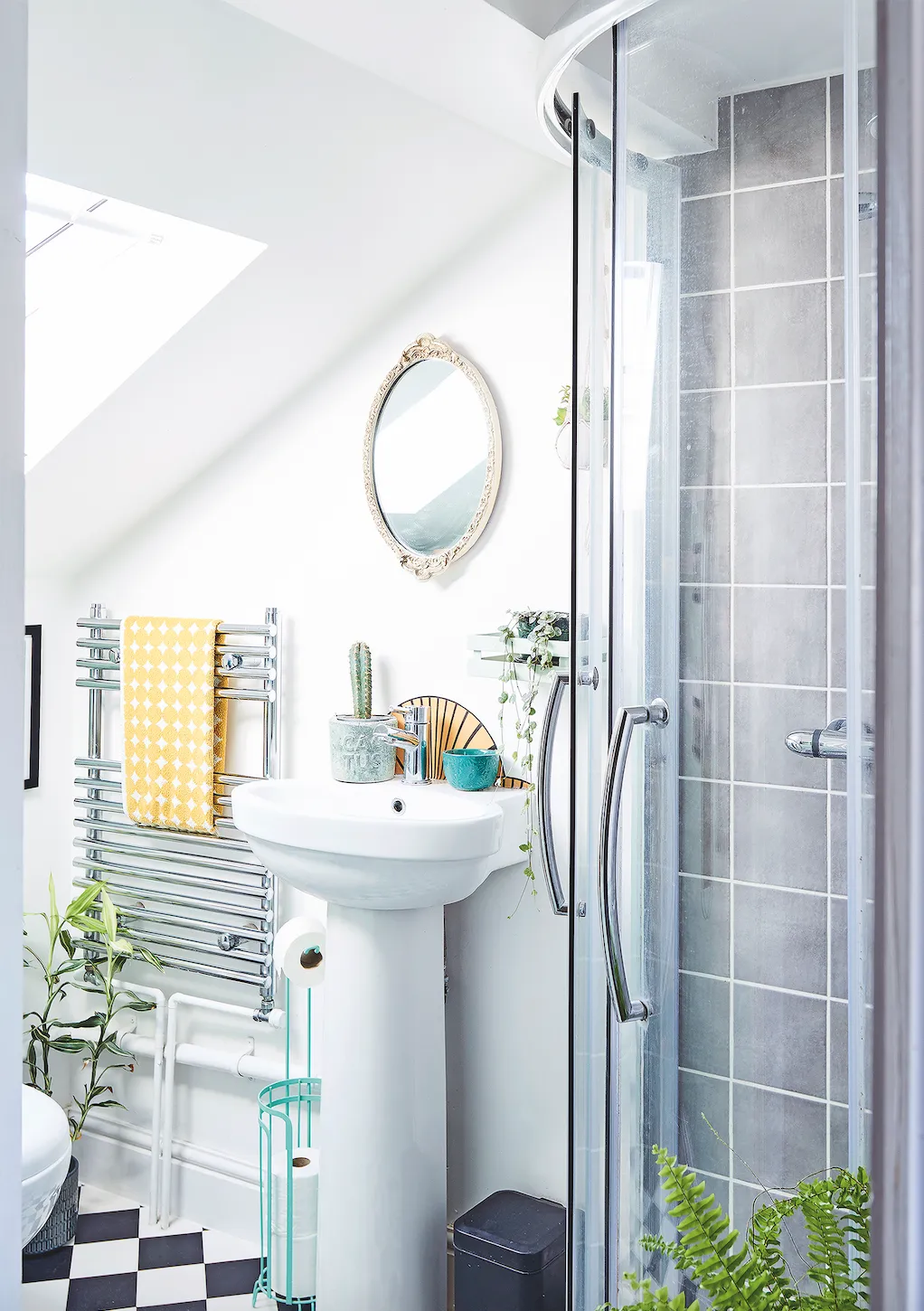 Even though Nikki has kept her petite en suite white and neutral to make it feel lighter and bigger, she’s added splashes of her favourite teals and yellows