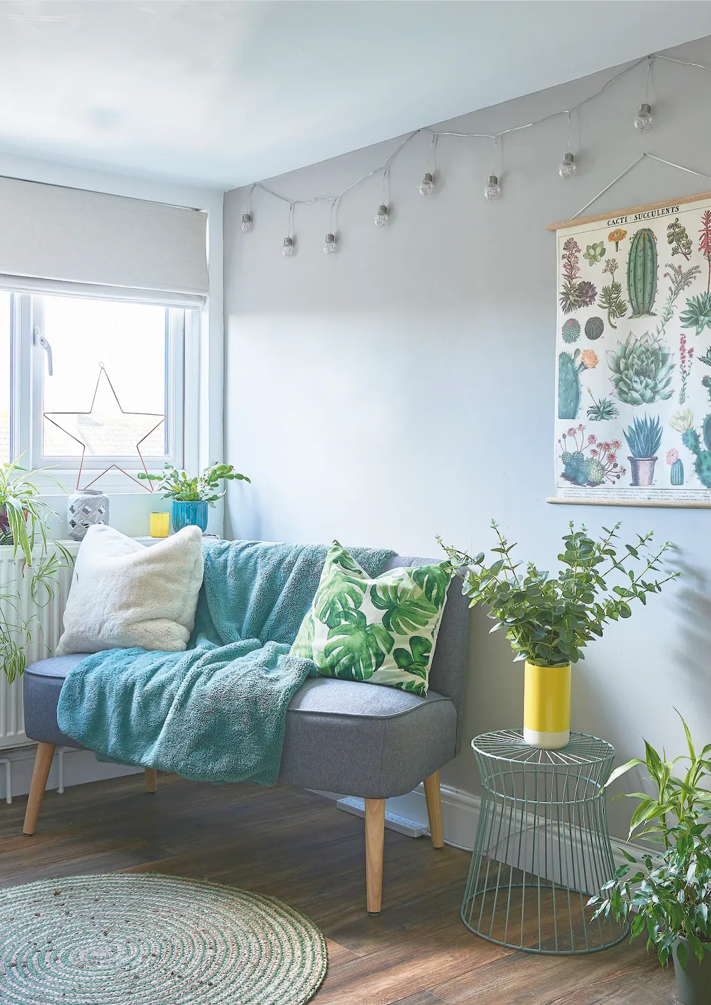 As well as lots of real plants, Nikki uses leafy prints to bring the outdoors in; both painted and real foliage make this corner of her bedroom feel fresh and inviting