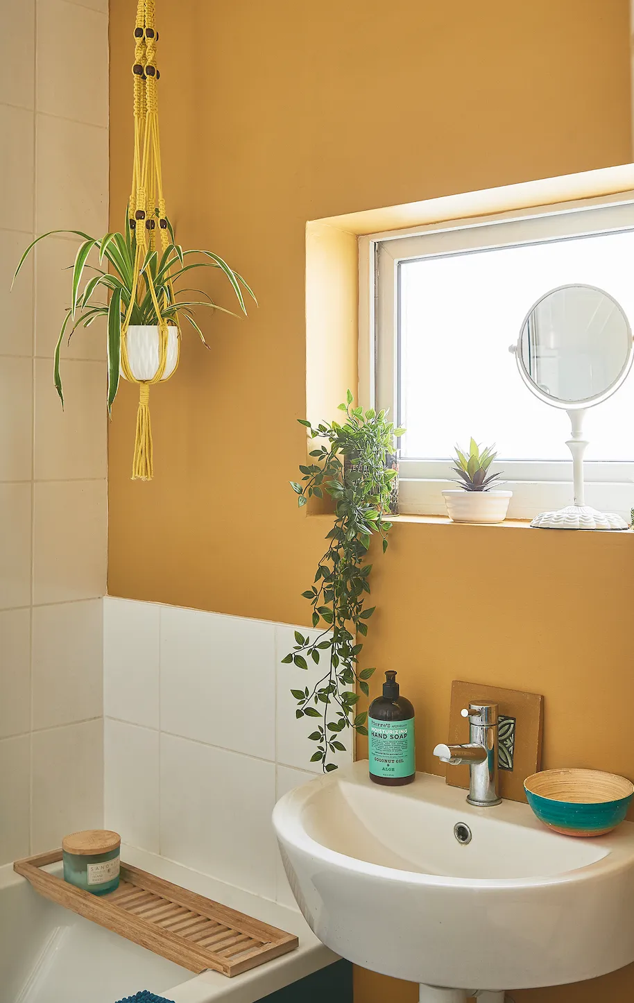 A dab hand at using colour in unexpected ways, Nikki hasn’t gone for classic blue for her bathroom, instead painting it a rich yellow to energise the family’s morning routine