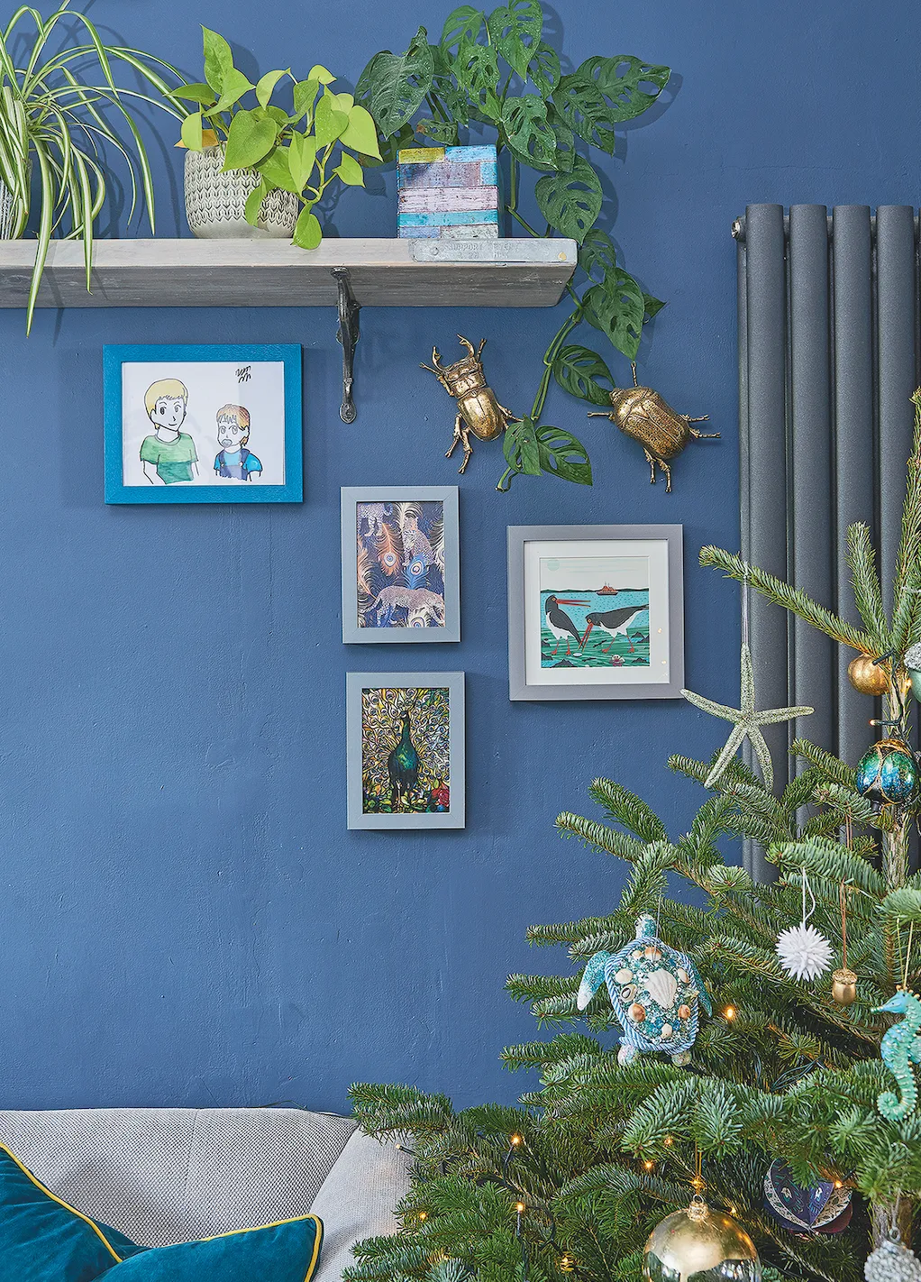 Nikki’s teal sofa was the catalyst for her bold colour choices throughout the house. She’s lifted her dark walls with green accents. ‘I wanted a calming space with an outside-in theme, so I’ve slowly added to our plant collection to create that,’ she says