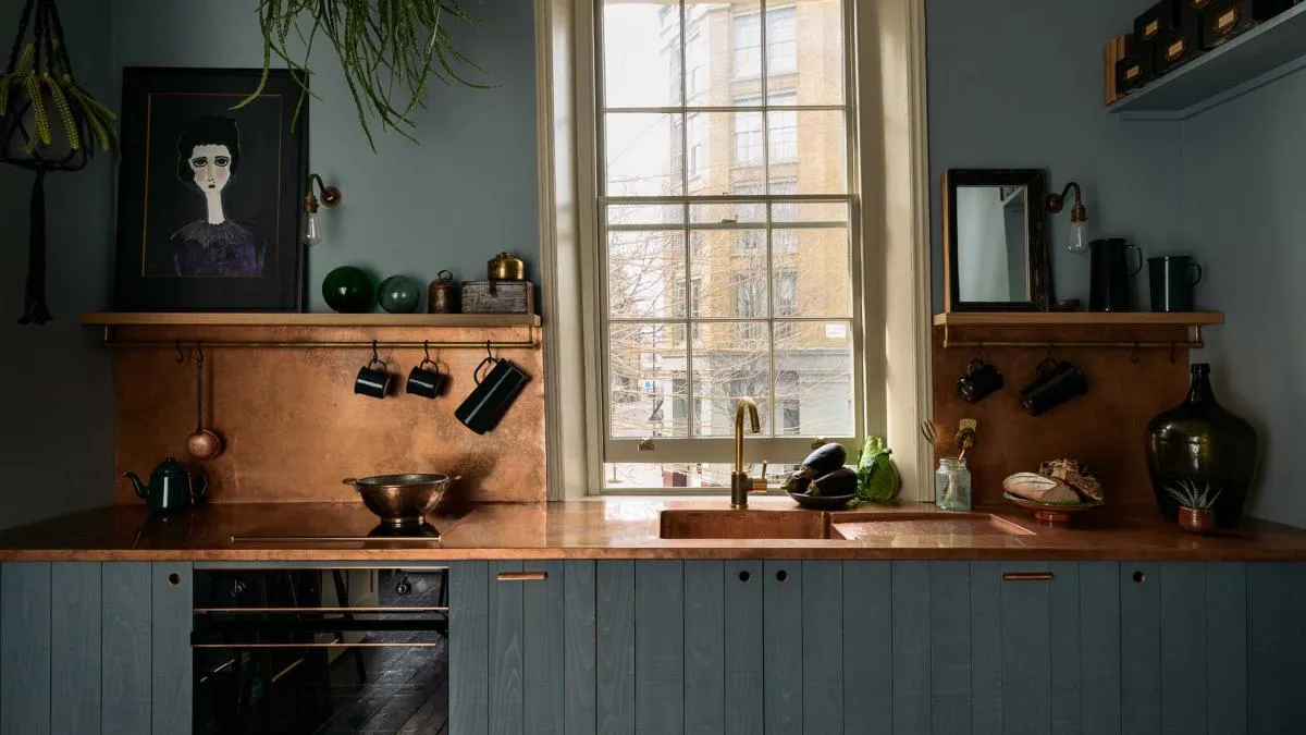 Bespoke copper tops and splashback in a Sebastian Cox kitchen, from £15,000; devolkitchens.co.uk