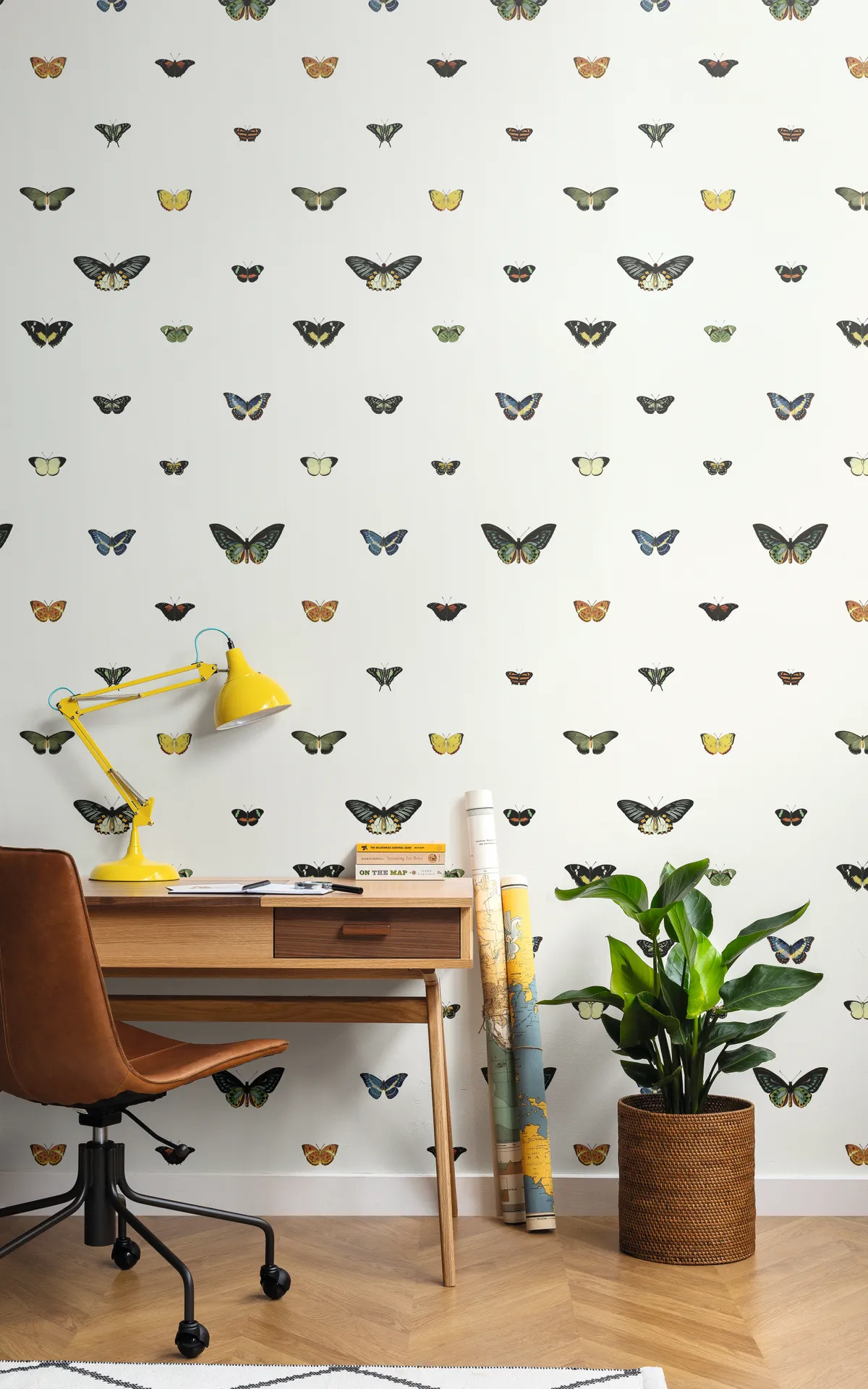 Butterfly-patterned wallpaper in a home office
