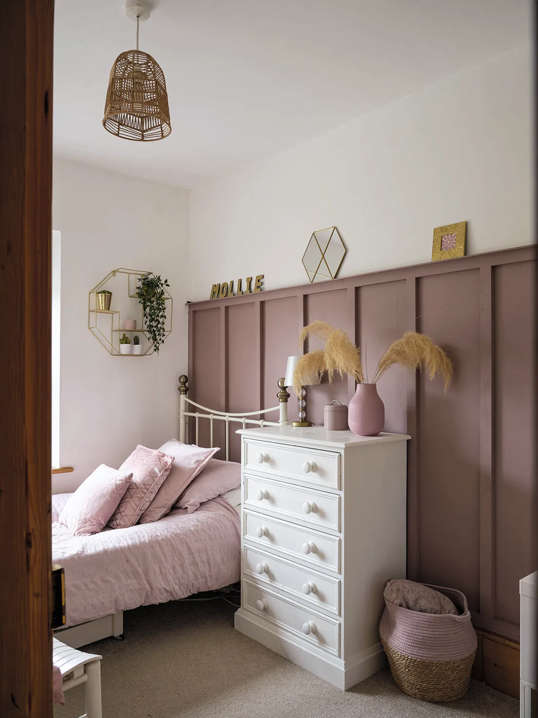 Ali has paired DIY panelling with geometric accessories in her daughter’s bedroom to make it youthful and trendy, yet in keeping with the classic look of the house