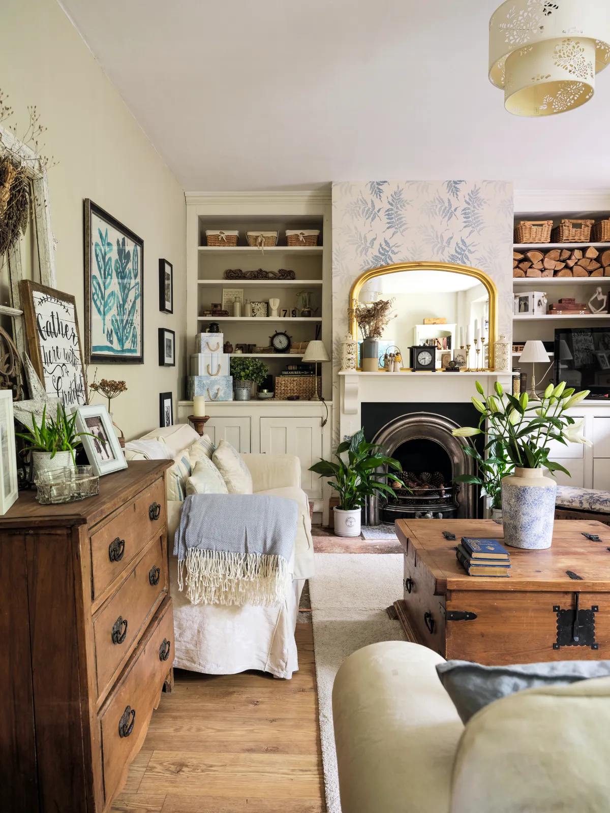 Originally two rooms, the lounge is now one big family space filled with traditional charm. ‘We also reinstated the fireplace and painted the orange pine woodwork to create a more restful feel,’ says Ali