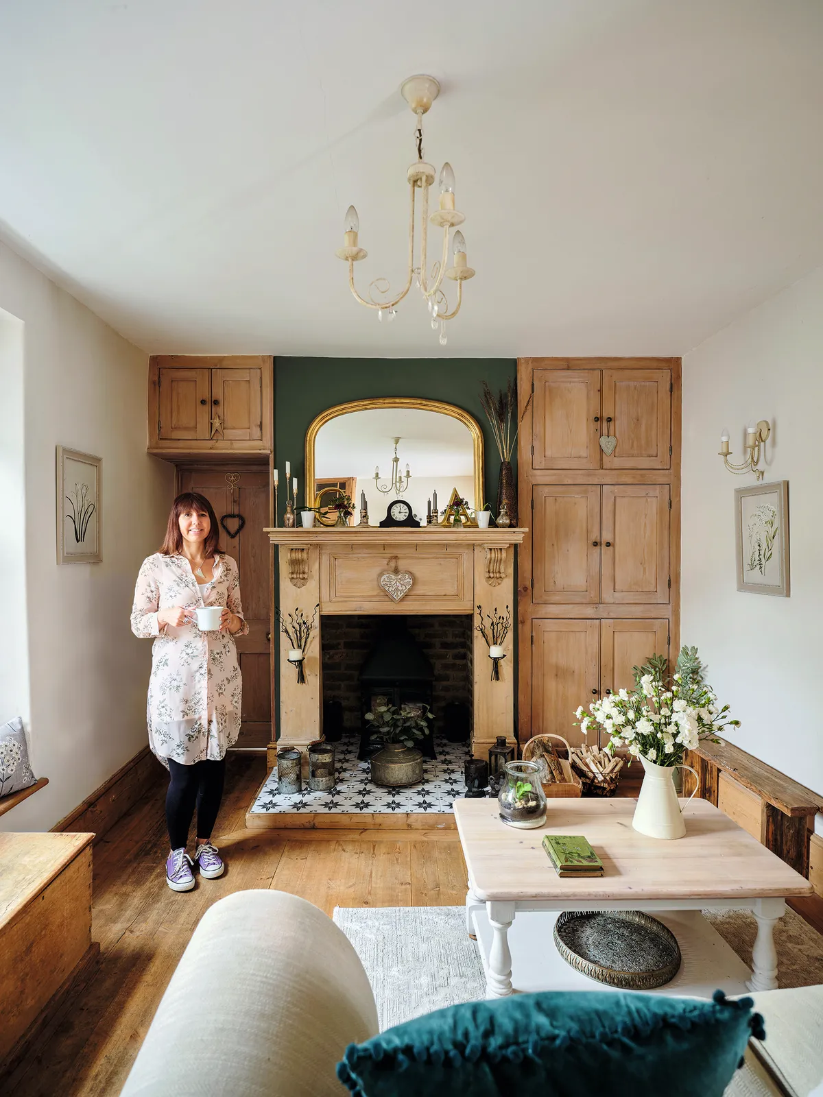 The couple have elevated existing features with DIY updates. ‘I wasn’t keen on the terracotta hearth tiles, so I painted them using a stencil,’ says Ali
