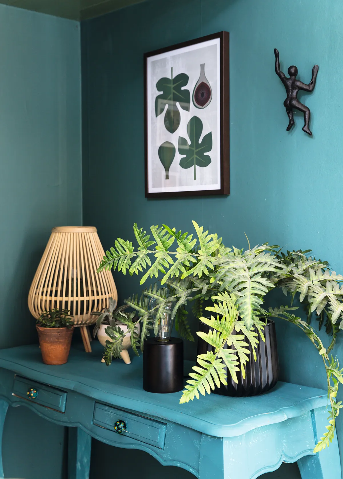 green console table in hallway