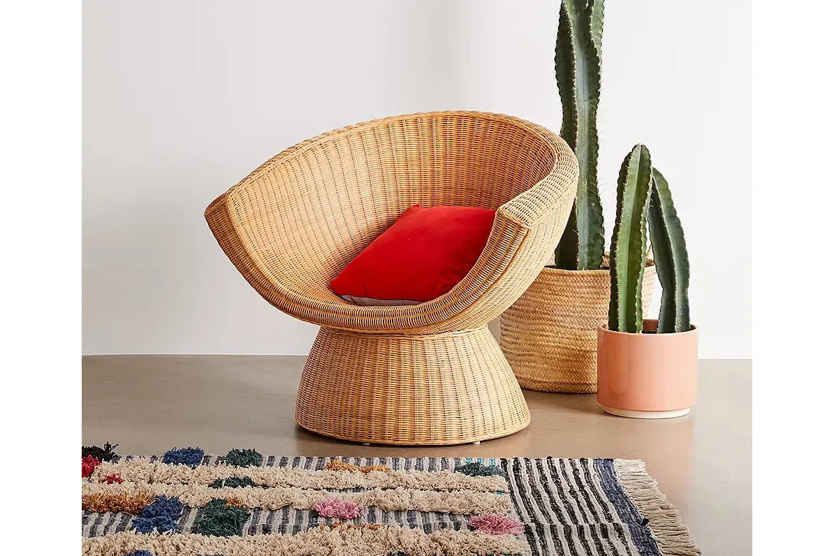 Rattan chair with red cushion
