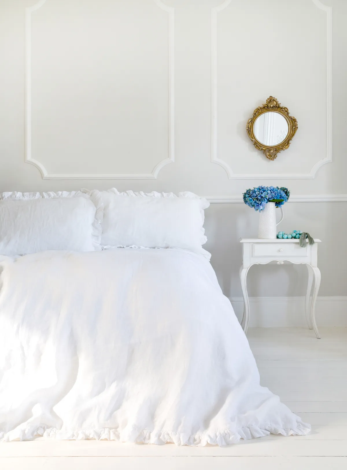 white and teal bedroom