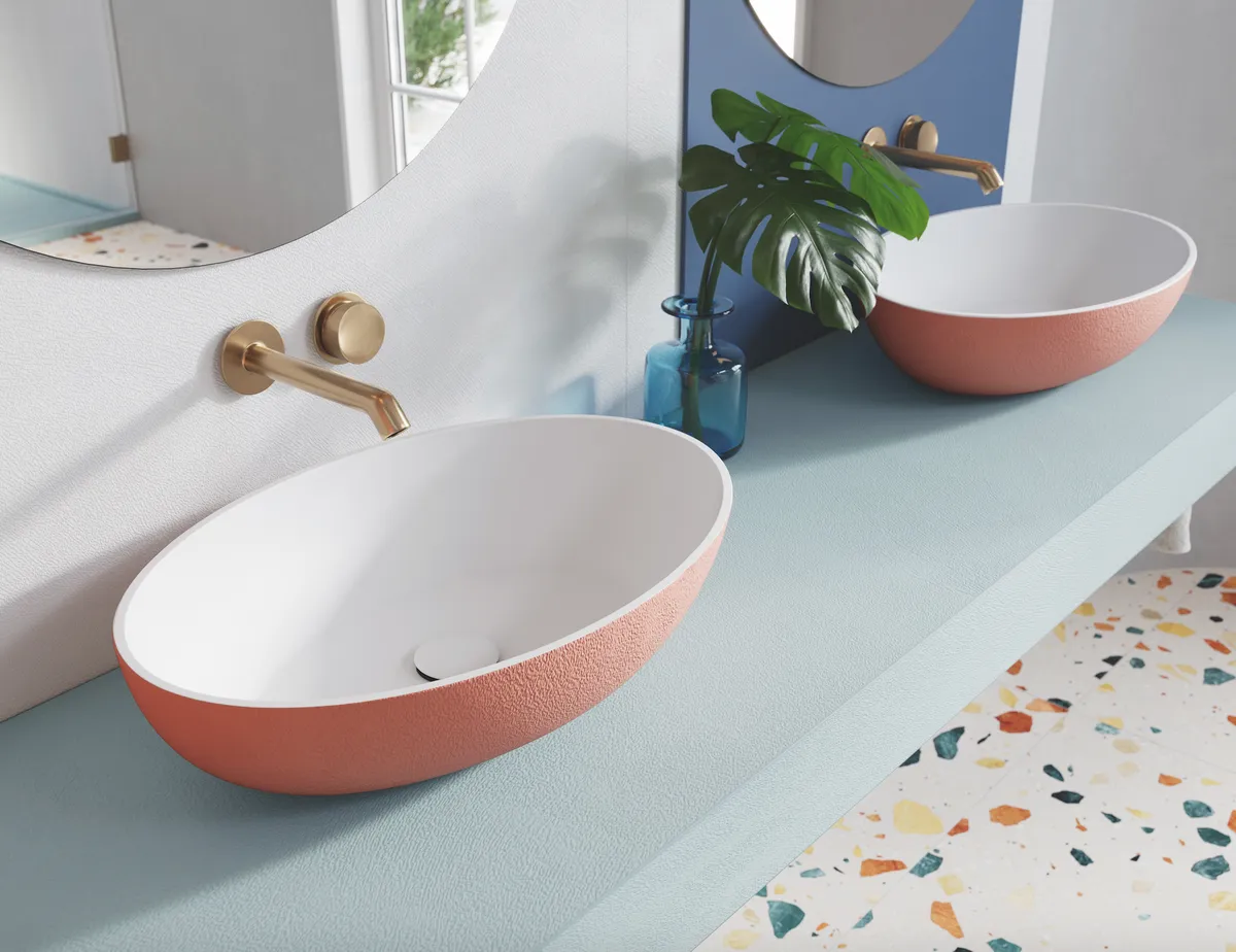 Oval Coral Glow XL basins, £575 each; made- to-measure One CF worktop in Abstract Blue, £7.47 per linear centimetre, both Acquabella