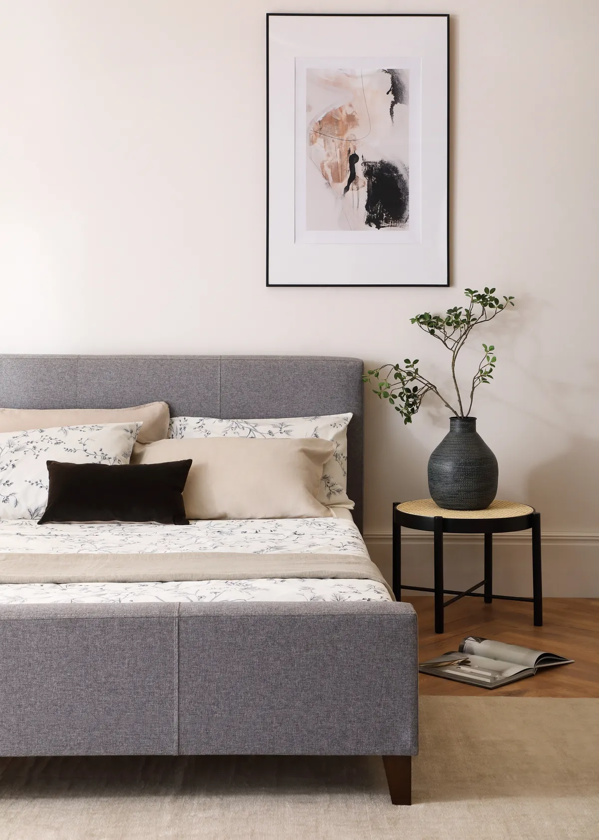 beige bedroom with grey bed