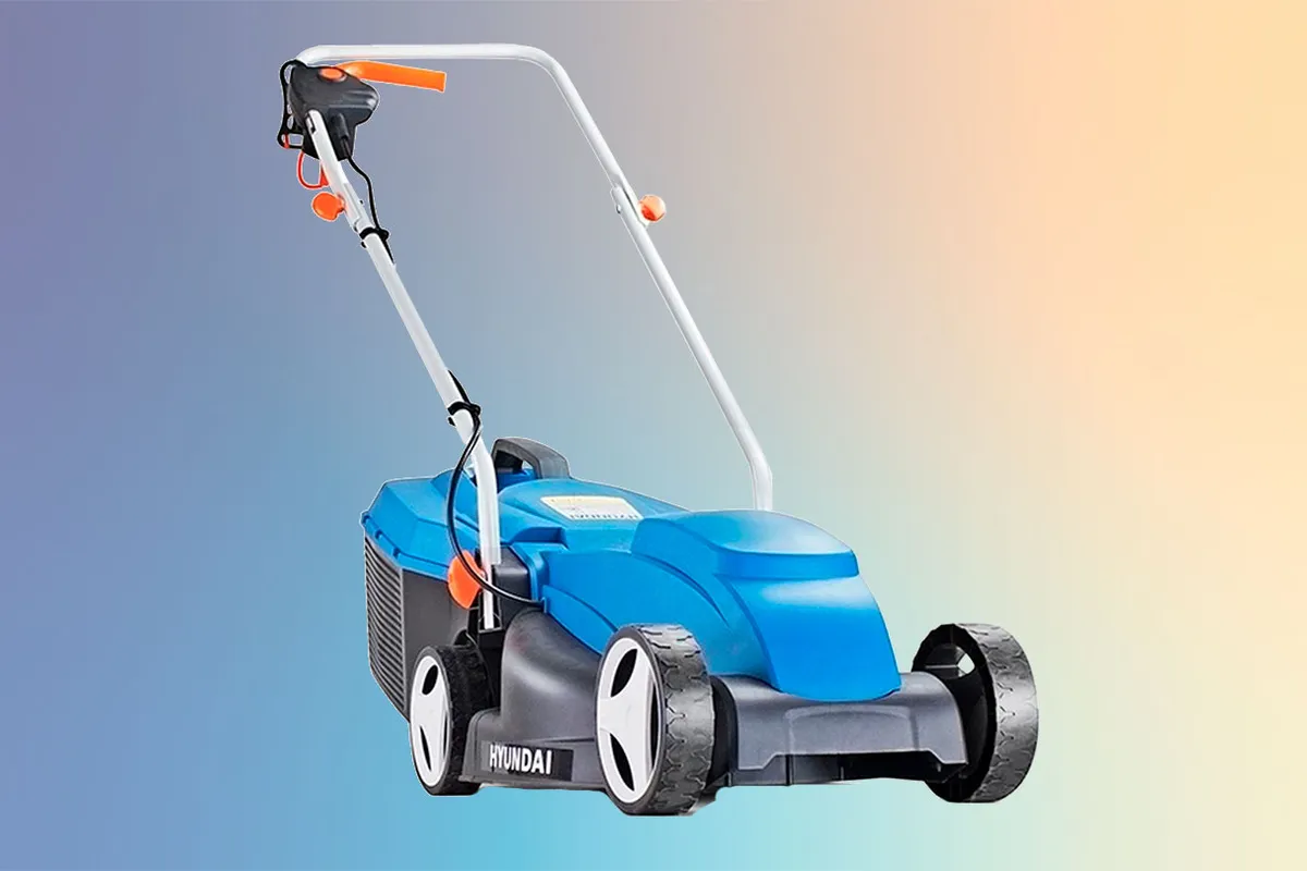 Hyundai 32cm Corded Electric Lawn Mower on a coloured background