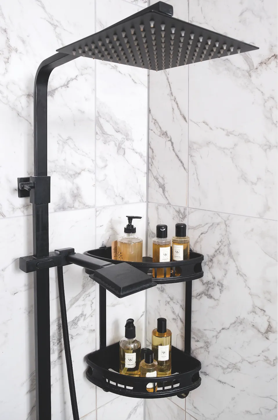 A compact bathroom needs savvy storage and Sylwia found a stylish solution in this two- tiered caddy, which fits neatly into the corner of the shower