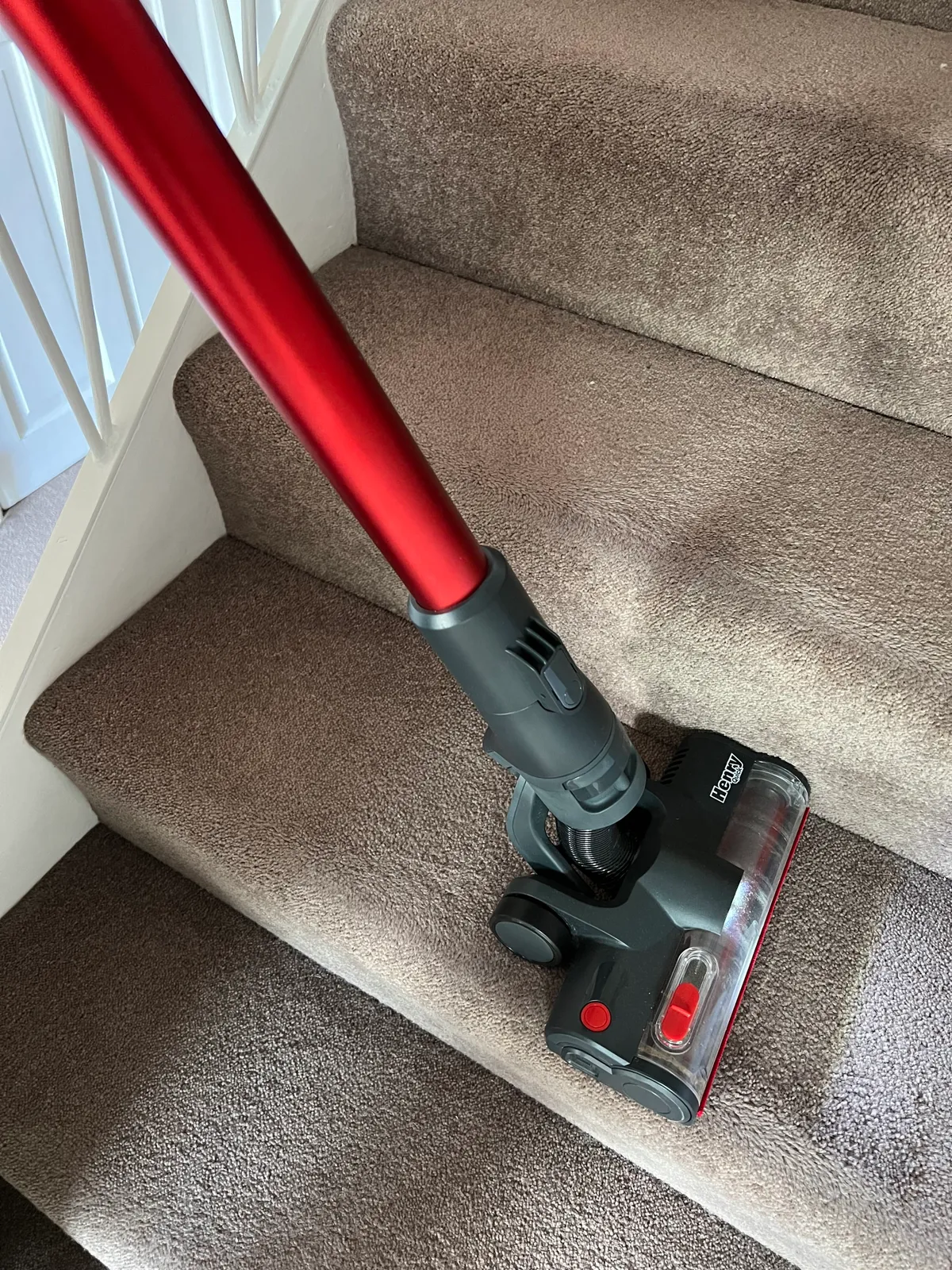 Henry Quick vacuum cleaner on stair