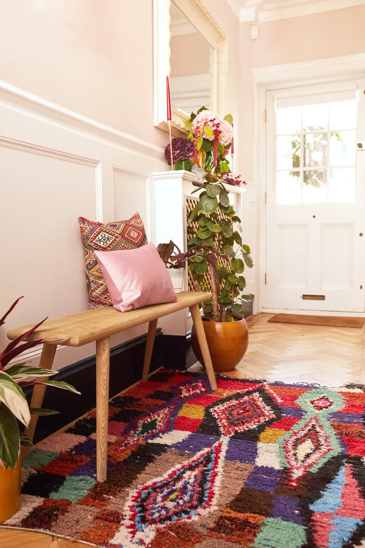 Hallway with bench and vintage Moroccan rug