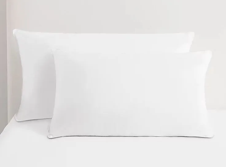 Two white feather pillows