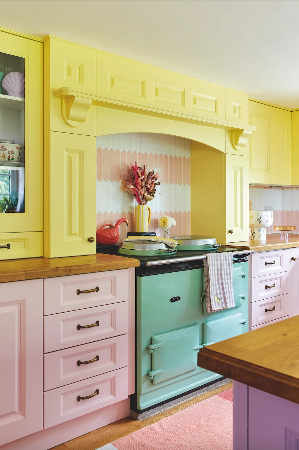 Once upon a time the kitchen units were white, but now this room encompasses all three of Charlotte’s key shades – green, yellow and pink. There’s always the chance it’ll evolve again. ‘I’ve already painted the kitchen twice. I don’t think my house will ever be finished,’ says Charlotte