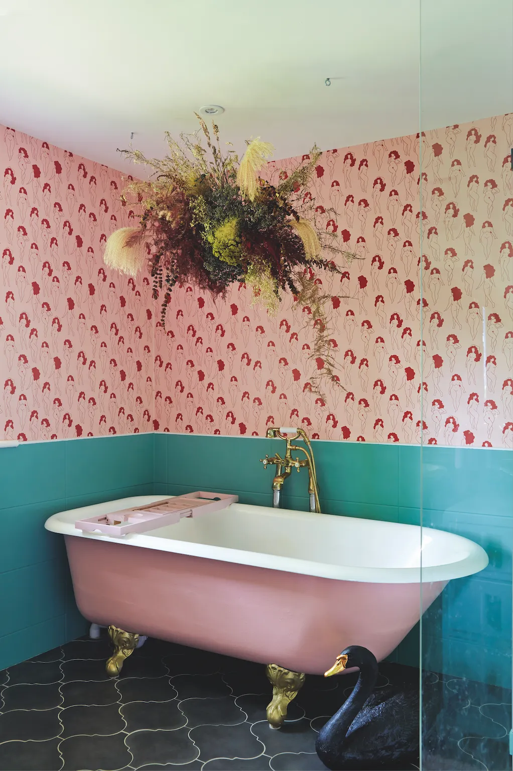 ‘We painted the interior of the bath with special bath enamel paint before painting the outside pink. I made a flower cloud to hang above it – a few years later and it’s still as good as new’