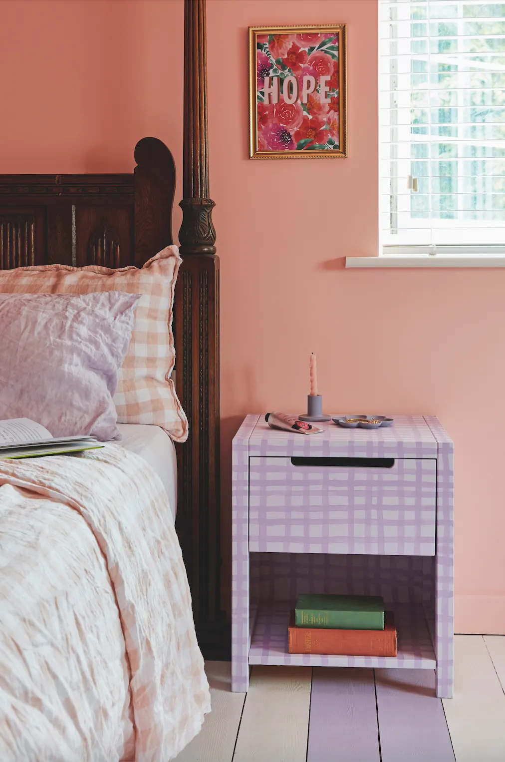 ‘The bedside table is part of a pair from eBay that I upcycled with Rust-Oleum furniture paint. The darker lines are Violet Macaroon and for the lighter colour I mixed it with white’