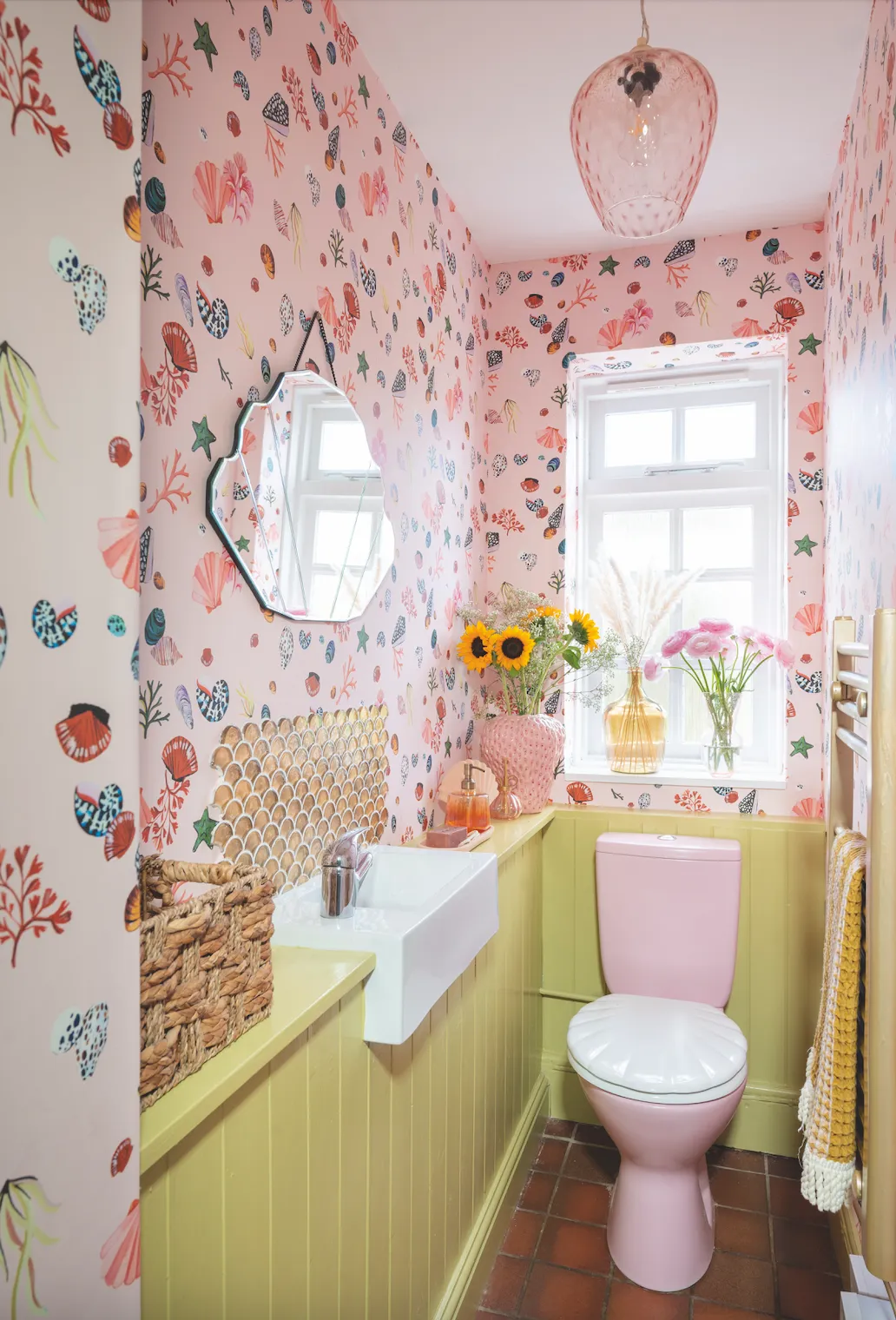 ‘I love the shell mirror as it adds to the overall look, but I also love my pink painted toilet… who wouldn’t?’