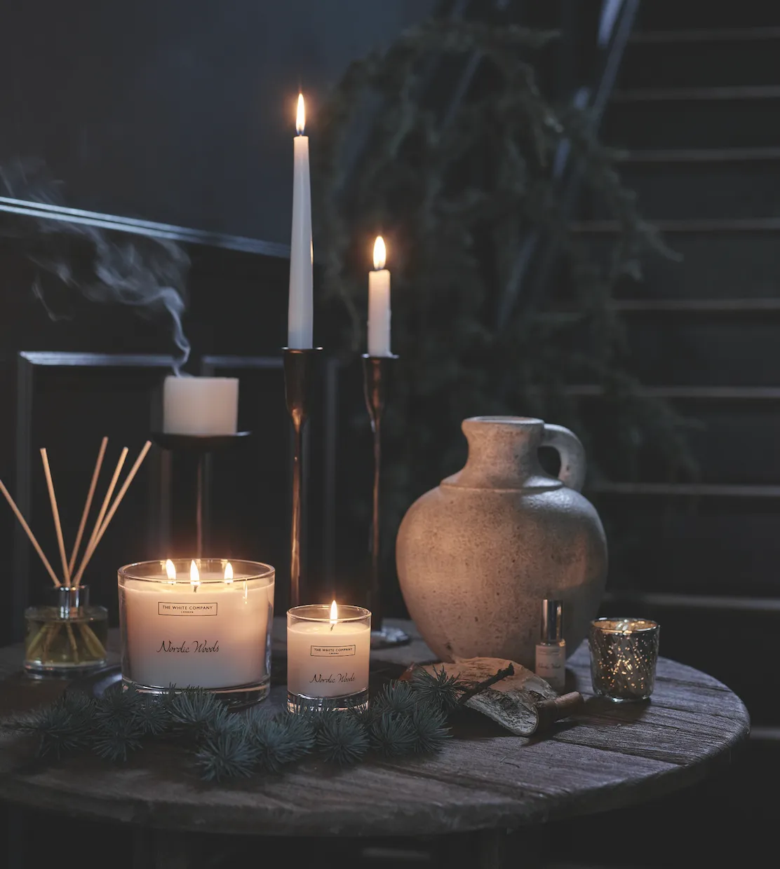 The Nordic Woods home fragrance collection is reminiscent of a frosty winter walk through a snow-covered forest with notes of eucalyptus, amber and birchwood Nordic Woods fragrance oil, £10, diffuser, £30, large candle, £65, signature candle, £22; Stanton forged Black pillar candle holder, £25; Stanton forged Black dinner candle holder, £30; Swirl mercury tea light holder, £6, all The White Company