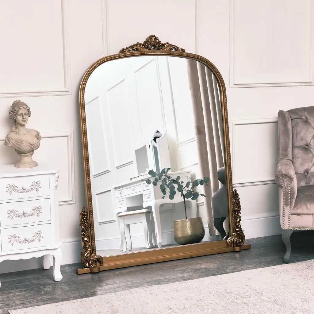 Large arch Antique Gold ornate overmantle mirror, £244.95, Melody Maison