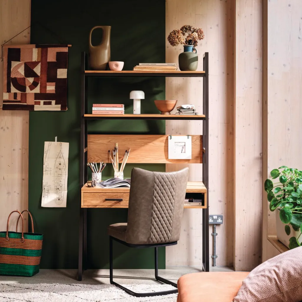 Earth wall desk, £549; Jude fabric storage footstool in Pumpkin Dexter, £395; Bodahl Loki cantilever dining chair in Olive, £289, all Furniture Village