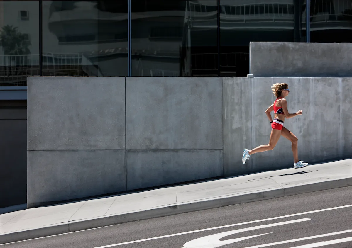 Young woman running in the city
