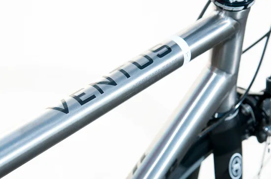 Thin tubing and natural finish on Van Nicholas Ventus SE road bike