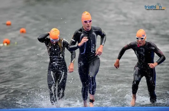 Athletes coming out of the water in Kitzbühel
