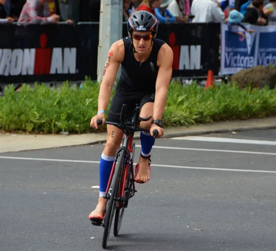 Tim Ballintine cycling in an Ironman race