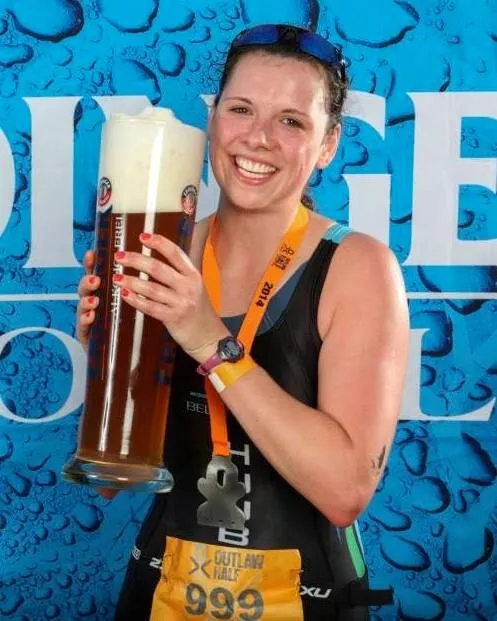 Michelle Willcocks celebrating post-race at the Outlaw Half