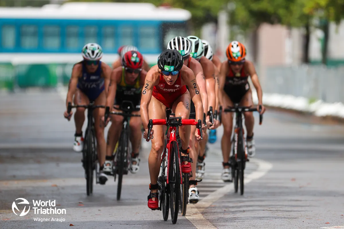 Oldest athlete in the race and 2012 Olympic champion, 39-year-old Nicola Spirig leads the first chase pack on the bike. 