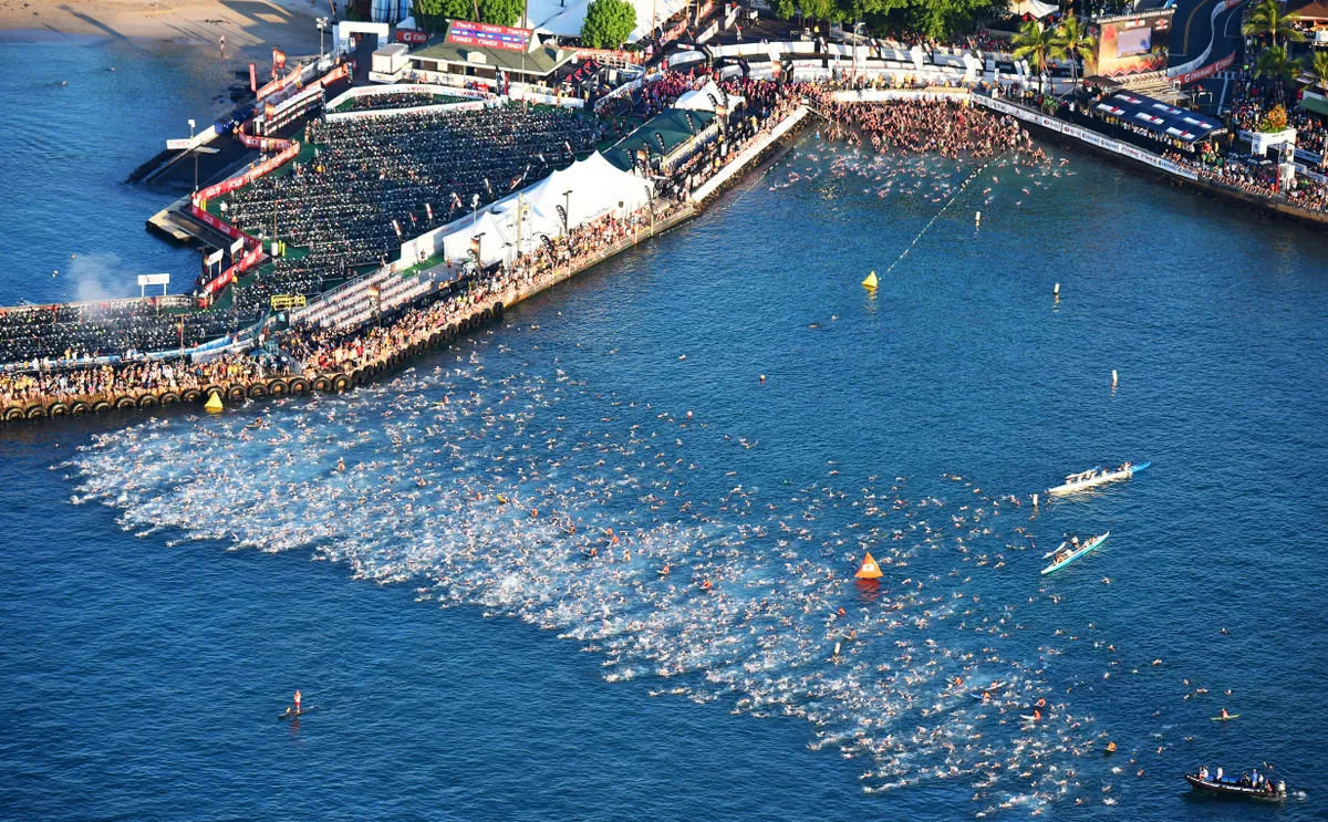 KAILUA KONA, HAWAII - OCTOBER 10: Triathletes compete in the 2.4-mile/3.8km swim during the IRONMAN World Championship presented by GoPro on October 10th 2015, Kailua Kona, Hawaii. (Photo by Delly Carr/IRONMAN) IRONMAN Triathlon consists of a 2.4-mile (3.86 km) swim, a 112-mile (180.25 km) bicycle ride and a marathon 26.2-mile (42.2 km) run. IRONMAN is considered one of the most difficult endurance events in the world.