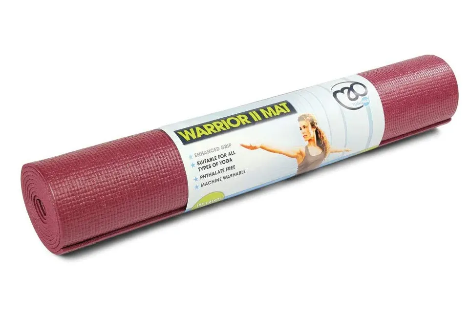 Red rolled up yoga mat