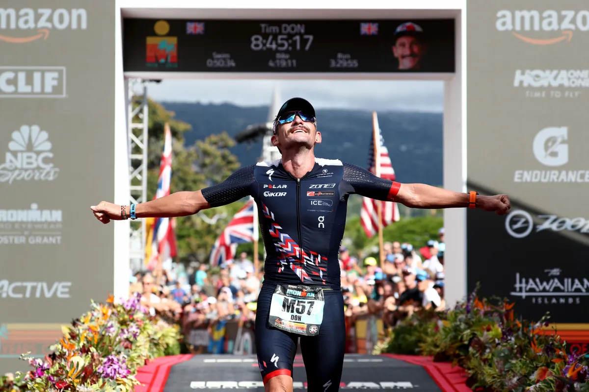 KAILUA KONA, HI - OCTOBER 13: Tim Don of Great Britain celebrates after finishing during the IRONMAN World Championships brought to you by Amazon on October 13, 2018 in Kailua Kona, Hawaii. (Photo by Al Bello/Getty Images for IRONMAN)