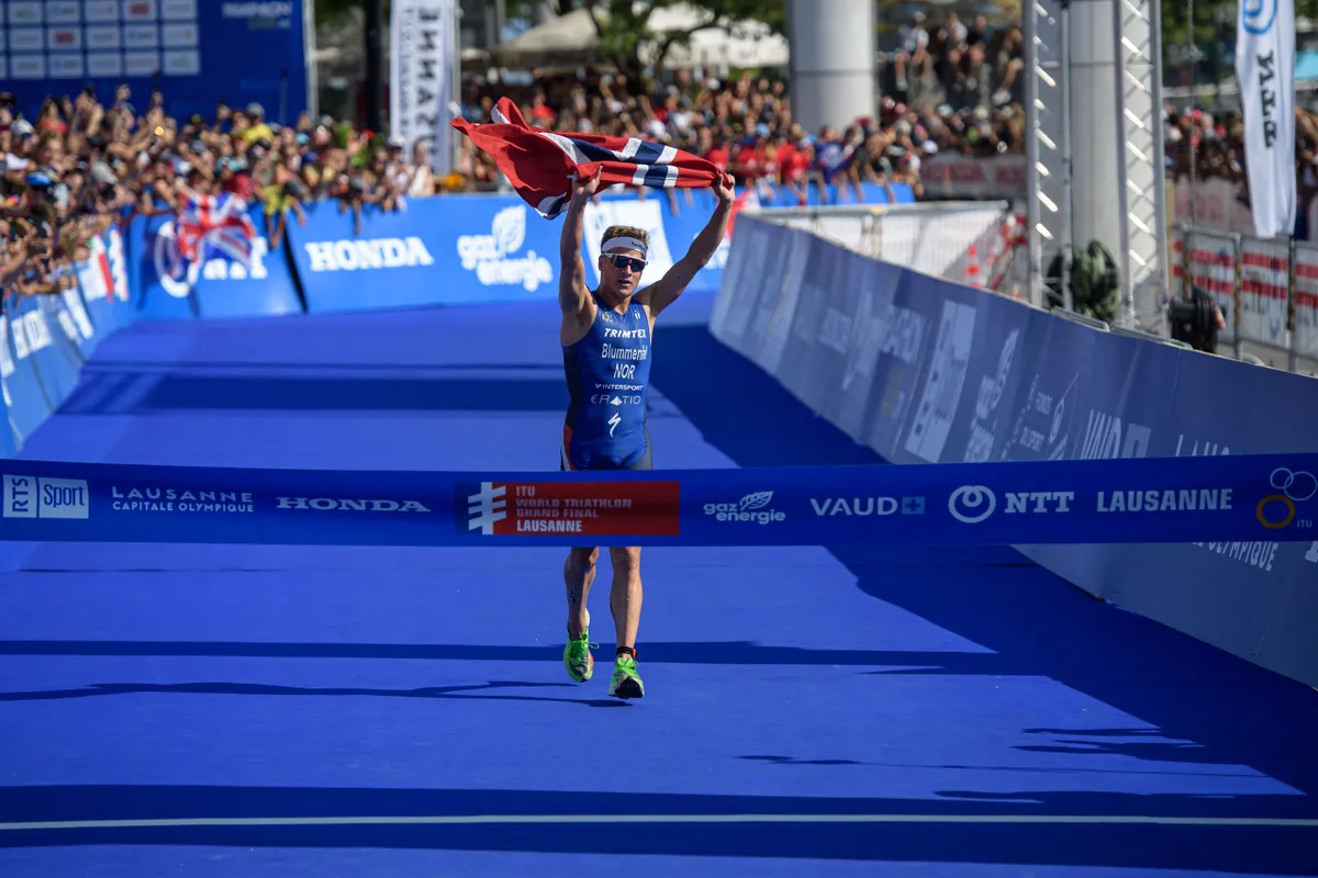 LAUSANNE, SWITZERLAND - AUGUST 31: Kristian Blummenfelt of Norway celebrates his victory during the men's elite olympic race at the ITU World Triathlon Grand Final on August 31, 2019 in Lausanne, Switzerland. (Photo by Jörg Schüler/Getty Images)